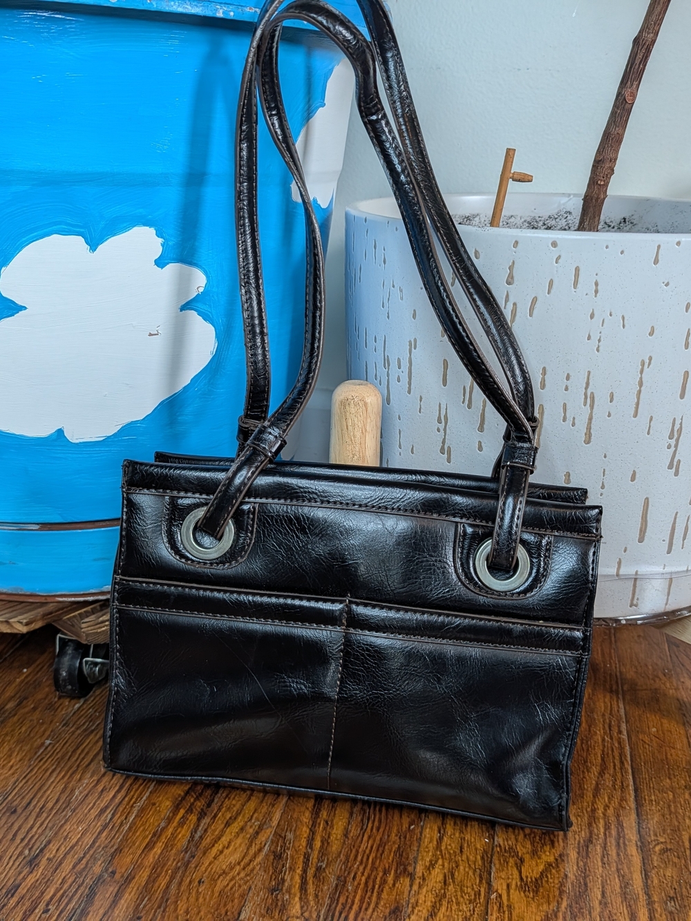 Covington Black Faux Leather Shoulder Bag with Metal Grommet Handles